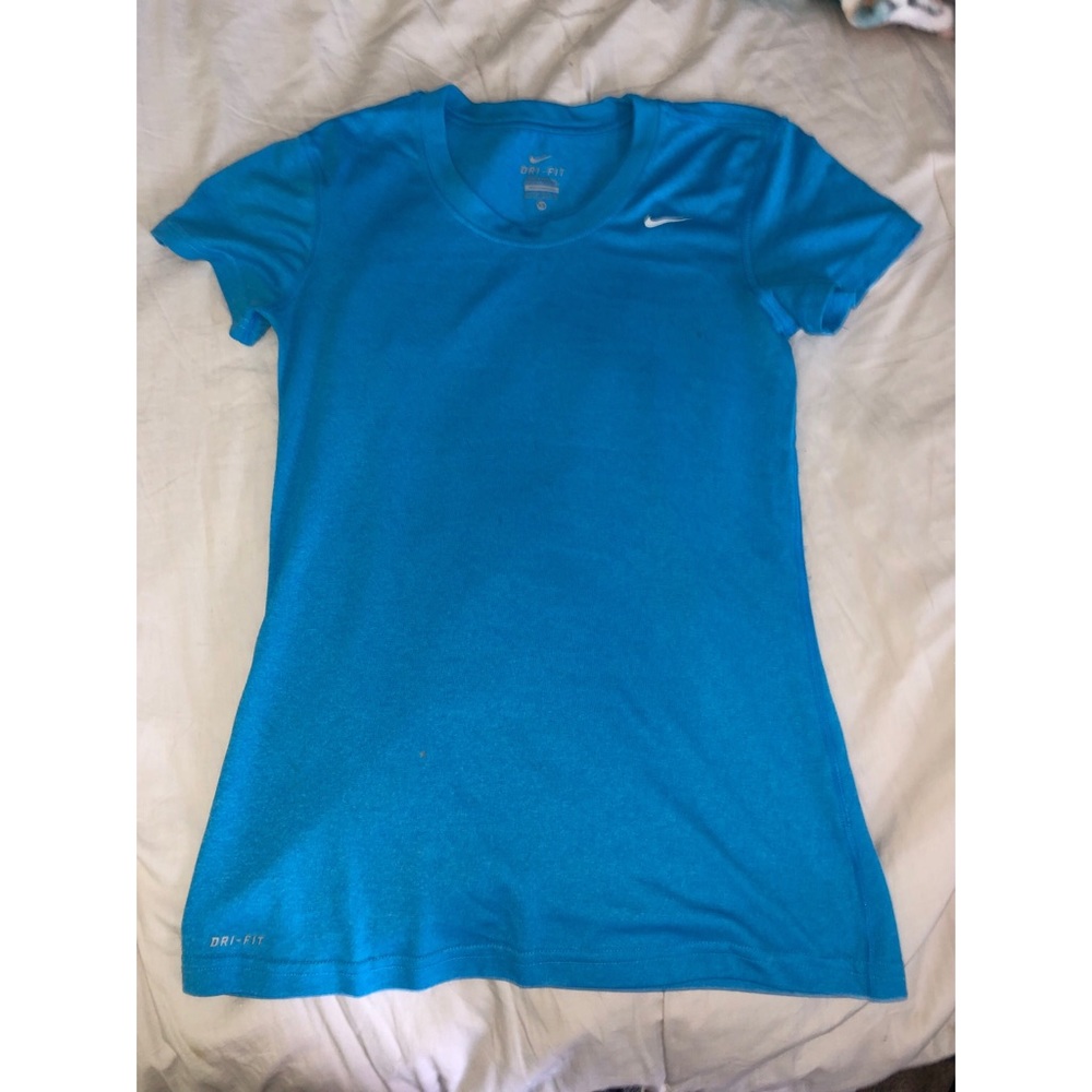 Bright blue Nike crew neck dry fit top